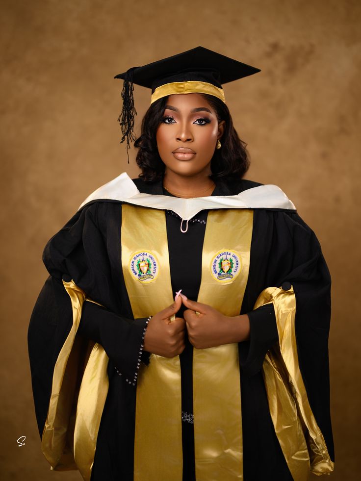 Graduate wearing ceremonial regalia