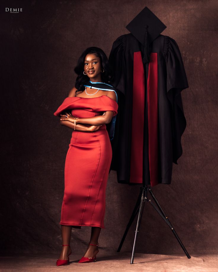 Graduate in a formal studio portrait