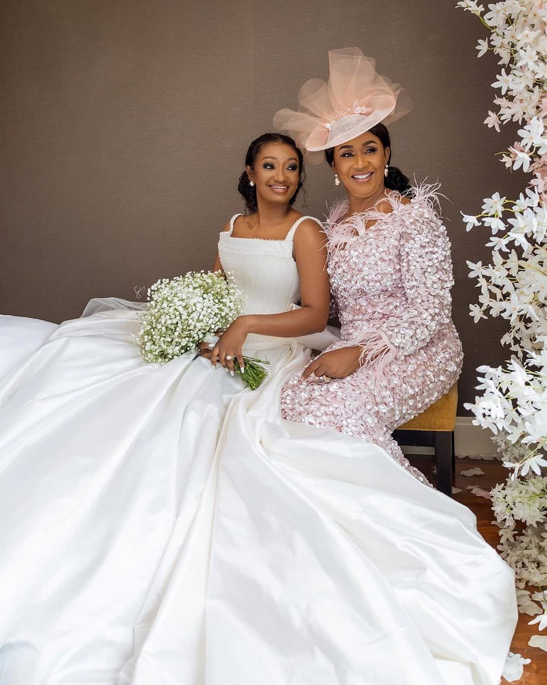 Bride seated with a family member