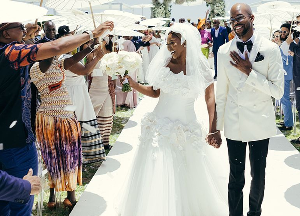Newlyweds leaving their ceremony
